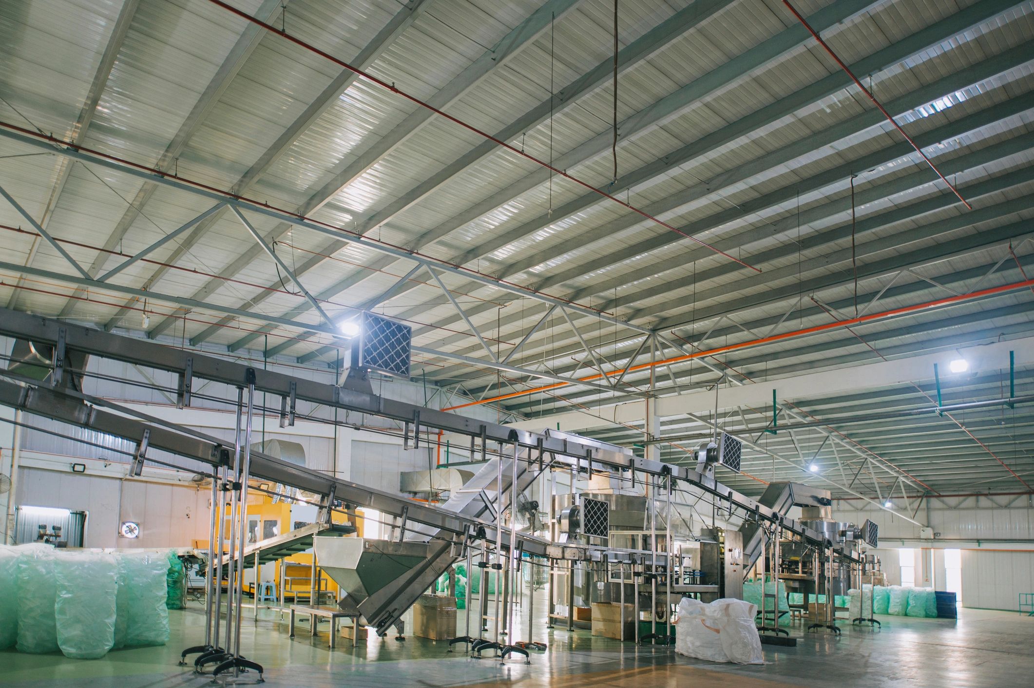 Factory production line with bottles in an industrial setting
