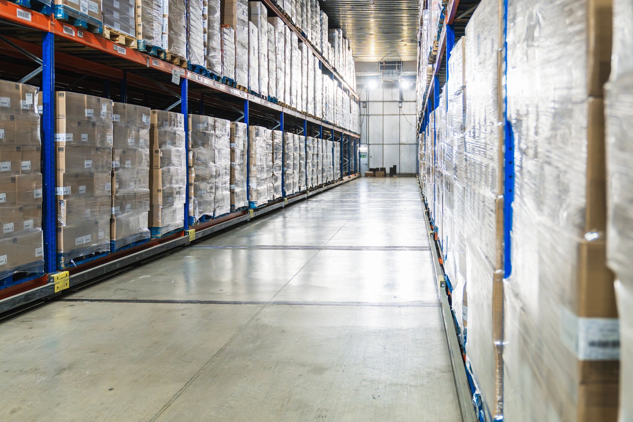 Cold storage warehouse with pallets and boxed inventory